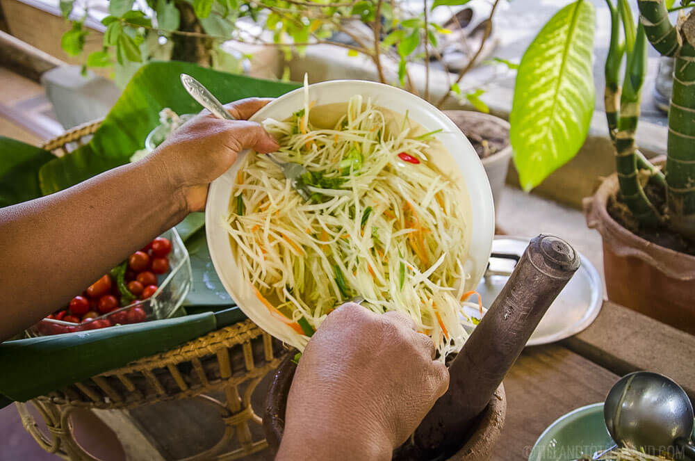Freshly grated unripe papaya for som tum Thai