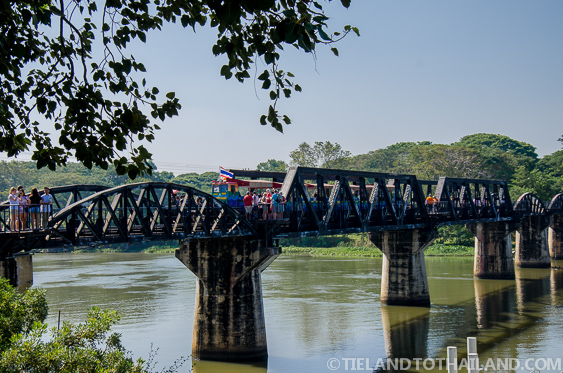 A small tourist train goes back and forh over the Bridge on the River Kwai